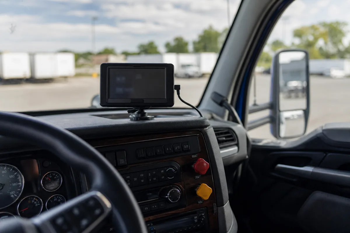 Electronic logging device and truck event data displayed beside a federal motor carrier safety lookup